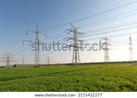 Similar – Foto Bild Freileitungsmasten mit Freileitungen im Sonnenuntergang / Energieversorgung