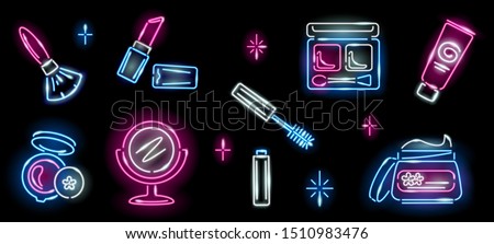 Set of neon cosmetics icons on black background: lipstick, brush, mirror, mascara, jar of cream, eyeshadow. Makeup, beauty, girly, woman concept. Night signboard style. Vector 10 EPS illustration. 