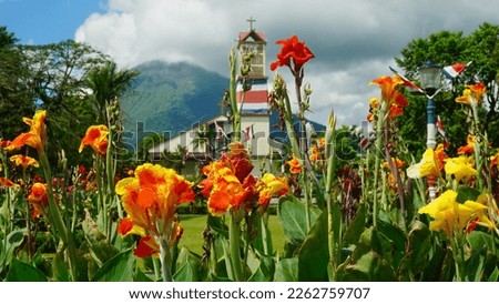 Beautiful view from the park in La Fortuna on the central church and the Arenal volcano in the background. Zdjęcia stock © 