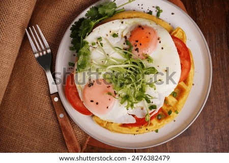 Similar – Image, Stock Photo Breakfast with egg, meat jamon, spinach and bread on terrace wooden table. Delicious homemade breakfast on balcony.