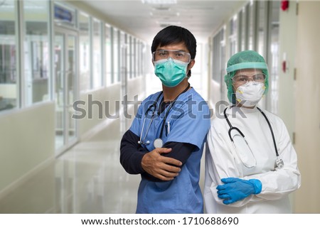 Similar – Image, Stock Photo Physician wearing personal protective equipment performing a Coronavirus COVID-19 PCR test