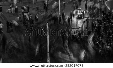 ISTANBUL, TURKEY May 14, 2015: Abstract long-exposure of the Taksim Place at night making the moving people seem like ghosts