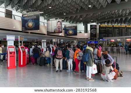 ISTANBUL, TURKEY May 14, 2015: Tourists waiting in a queue at the airport in Istanbul