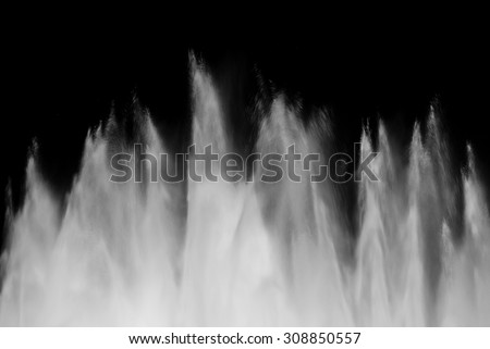 Abstract water spout of a fountain