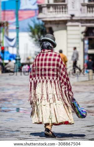 CUSCO, PERU Circa March 2015: a traditionally clothed woman in cusco