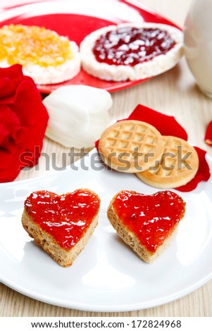 a sweet breakfast with love and red hearths of jam