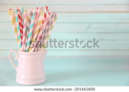 Party colored paper and striped straw
