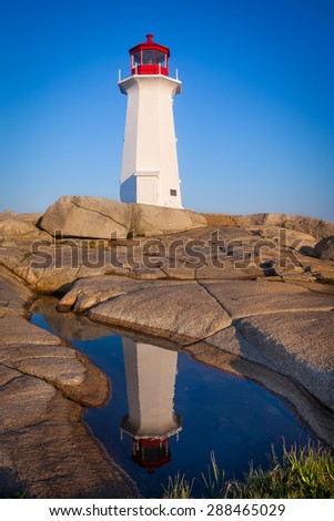 Reflection of Peggy\'s Cove lighthouse, Nova Scotia, Canada