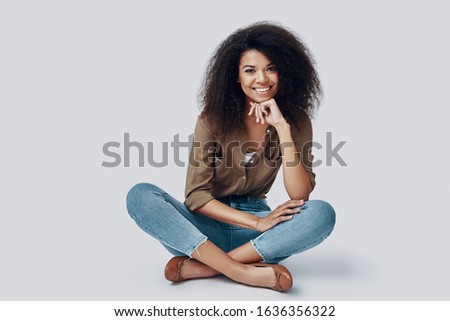 Similar – Image, Stock Photo Elegant woman sitting against brick wall