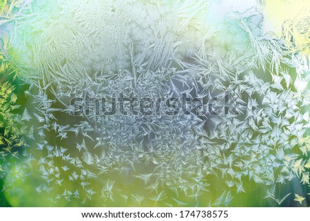 Ice patterns on winter glass.Winter background