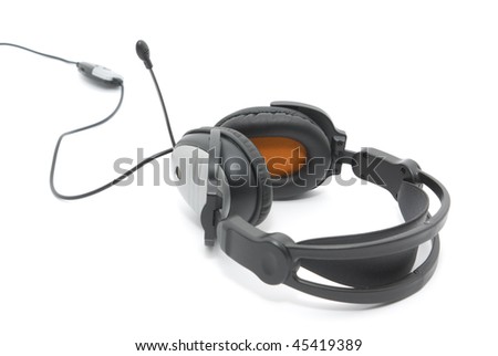 Black headphones with cord on white ground