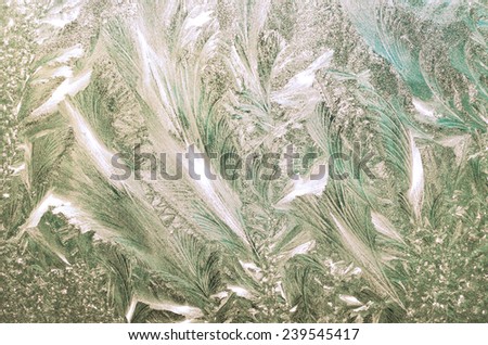 Ice patterns on winter glass.Winter background