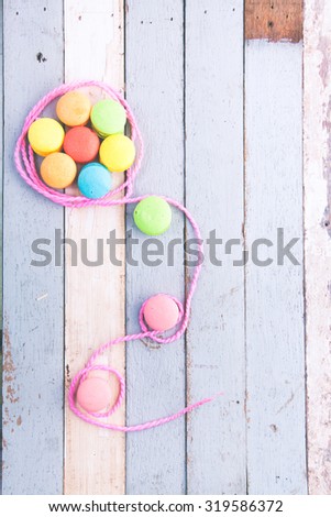 idea colorful eggs as flying balloon with label tag on vintage wood background