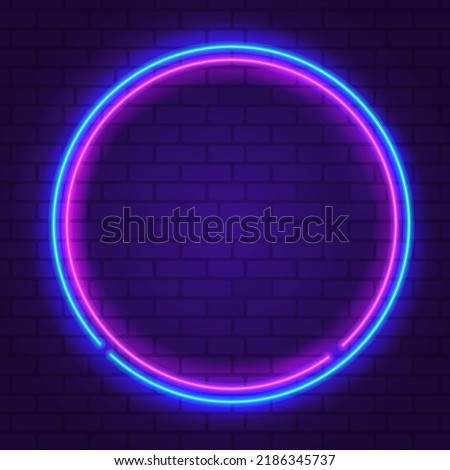 Round neon frame Pink and Blue colors at purple brick wall background. Glowing neon frame in retro 80s - 90s style. Colored neon sign with empty space. Editable Vector
