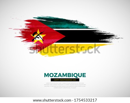 Grunge style brush painted Mozambique country flag illustration with Independence day typography. Artistic watercolor brush flag vector