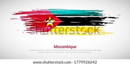 Artistic grungy watercolor brush flag of Mozambique country. Happy independence day of Mozambique background