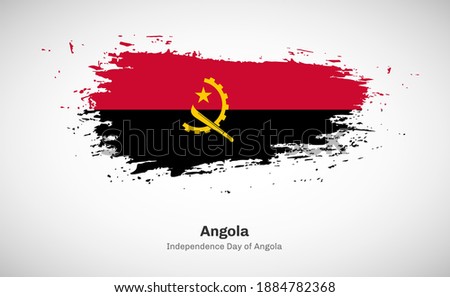 Creative happy independence day of Angola country with grungy watercolor country flag background