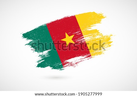 Happy independence day of Cameroon with vintage style brush flag background