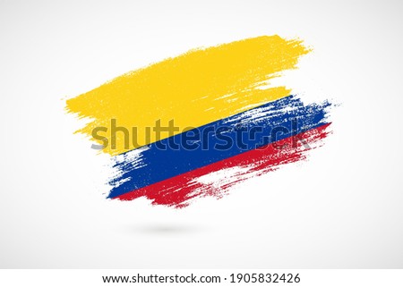 Happy independence day of Colombia with vintage style brush flag background