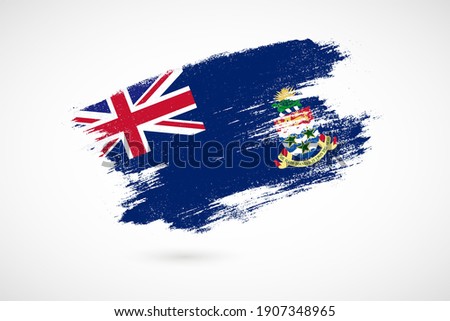 Happy national heroes day of Cayman Islands with vintage style brush flag background