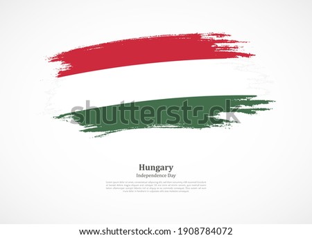 Happy national day of Hungary with national flag on grunge texture
