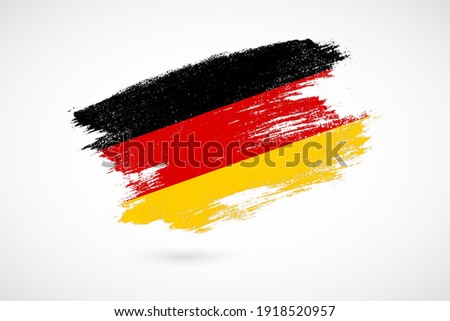 Happy German unity day of Germany with vintage style brush flag background Сток-фото © 