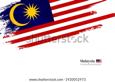 Stylish brush flag of Malaysia. Happy independence day of Malaysia with grungy flag background