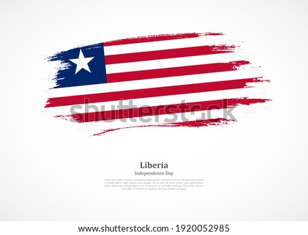 Happy independence day of Liberia with national flag on grunge texture