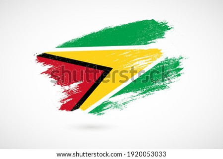 Happy independence day of Guyana with vintage style brush flag background