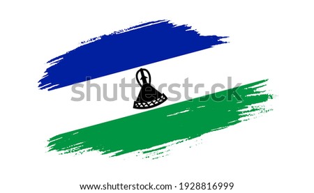 Patriotic of Lesotho flag in brush stroke effect on white background