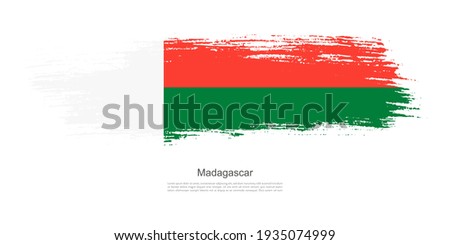 Stain brush stroke flag of Madagascar with creative brush flag banner theme background