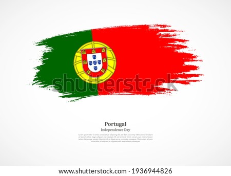 Happy independence day of Portugal with national flag on grunge texture
