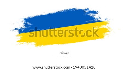 Happy independence day of Ukraine with national flag on artistic stain brush stroke background