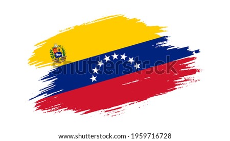 Patriotic of Venezuela flag in brush stroke effect on white background