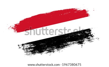Flag of Yemen country on brush paint stroke trail view. Elegant texture of national country flag