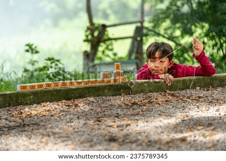 Similar – Image, Stock Photo Young asian boy stay alone and sadness