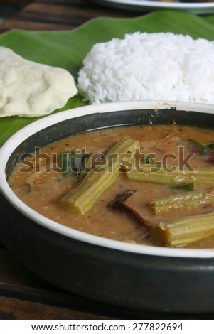 Drumstick Sambar - A thick stew of lentils with vegetables and seasoned with exotic spices.Drumstick sambar contains drumstick as major ingredient.It is eaten with rice and rice dishes