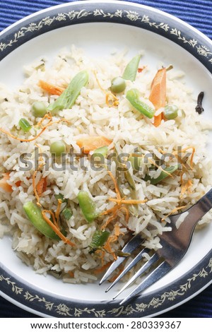 Vegetable Biryani - A popular Indian veg dish made with vegetales and Basmati rice.