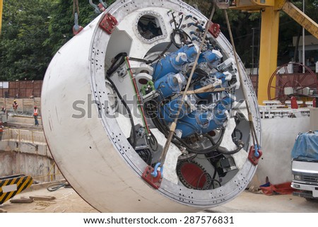 Bangalore, Karnataka, India - November 21, 2006: Construction site with tunnel digging machine building metro