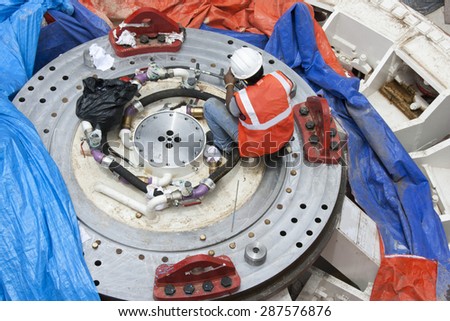 Bangalore, Karnataka, India - September 15, 2012: Tunnel Boring Machine being assembled