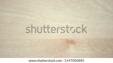 Similar – Image, Stock Photo Knotted remainder of an orange fluttering band on a rusty iron bar of a fence in front of a brown background