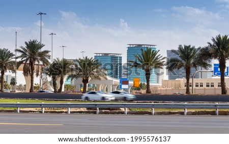 The ring road in the Saudi capital, Riyadh, and on both sides of the road there are palm trees