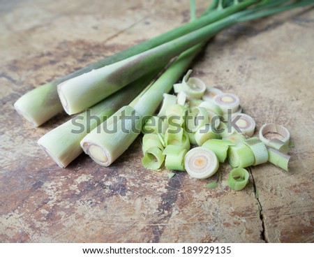 Sliced lemongrass on chopping board