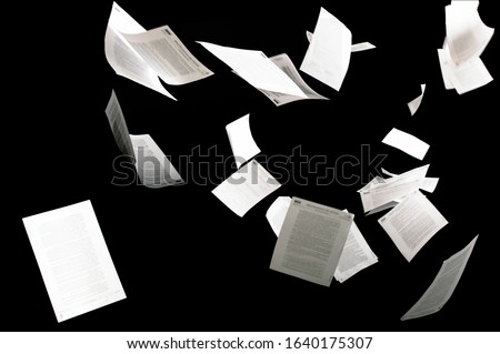 Many flying business documents isolated on black background Papers flying in air in business concept