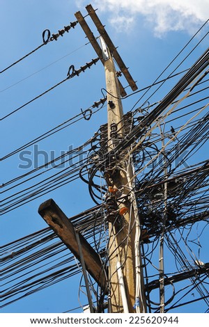 There are high-voltage power pole wiring mess of thousands