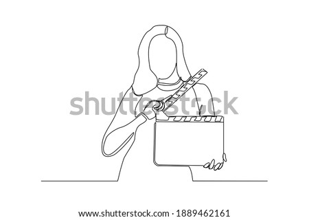 Continuous line drawing of woman hold retro old classic movie board clapper. Vintage film scene taker item concept single one line art design graphic vector illustration