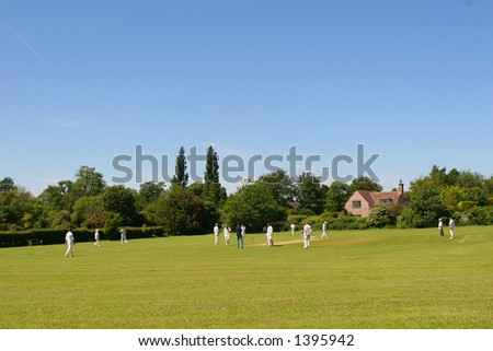 Two local cricket teams on a village green