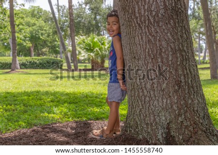 Image, Stock Photo Child stands under a pepper tree in the sun