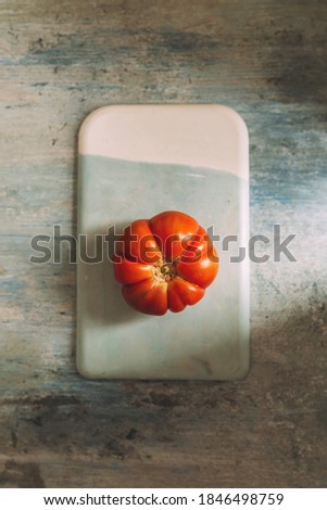 Fresh red Marmande RAF red tomatoes, on celestial and white stone table Zdjęcia stock © 