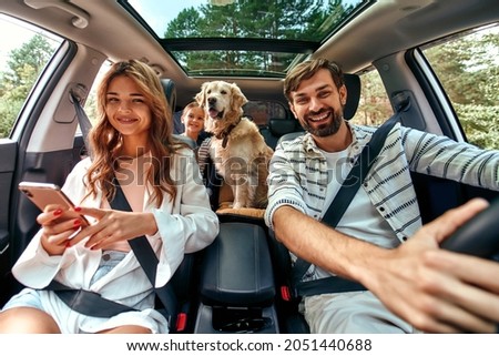 Similar – Image, Stock Photo Man sits in car and looks seriously out the window